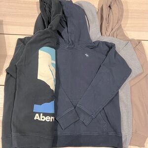 Lot of four hoodies.